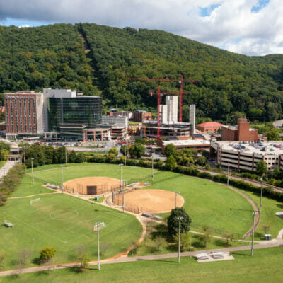 Aerial view of athletic fields at River's Edge Park South with Mill Mountain in distance