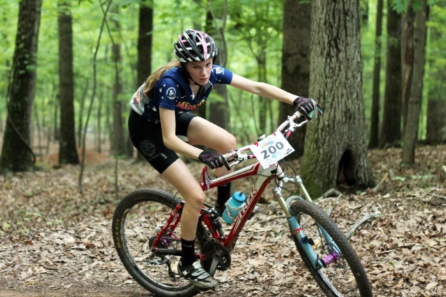 Female mountain biker on switchback in Roanoke