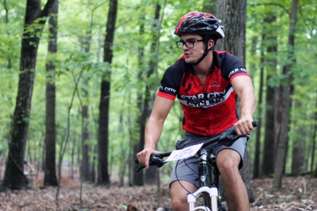 Male mountain biker on Sidewinder trail in Mill Mountain Park