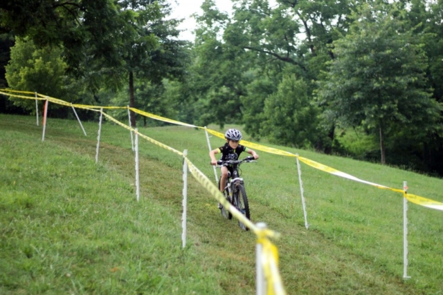 Fishburn youth mountain biker rides down hill