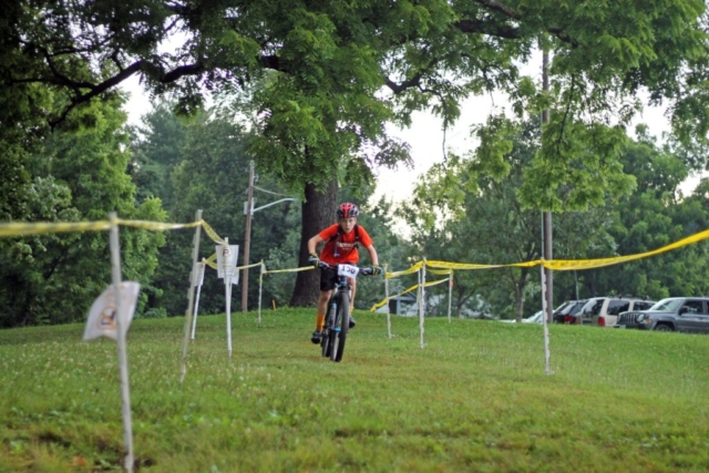 Fishburn youth mountain biker rides down straightaway at the Play Roanoke event
