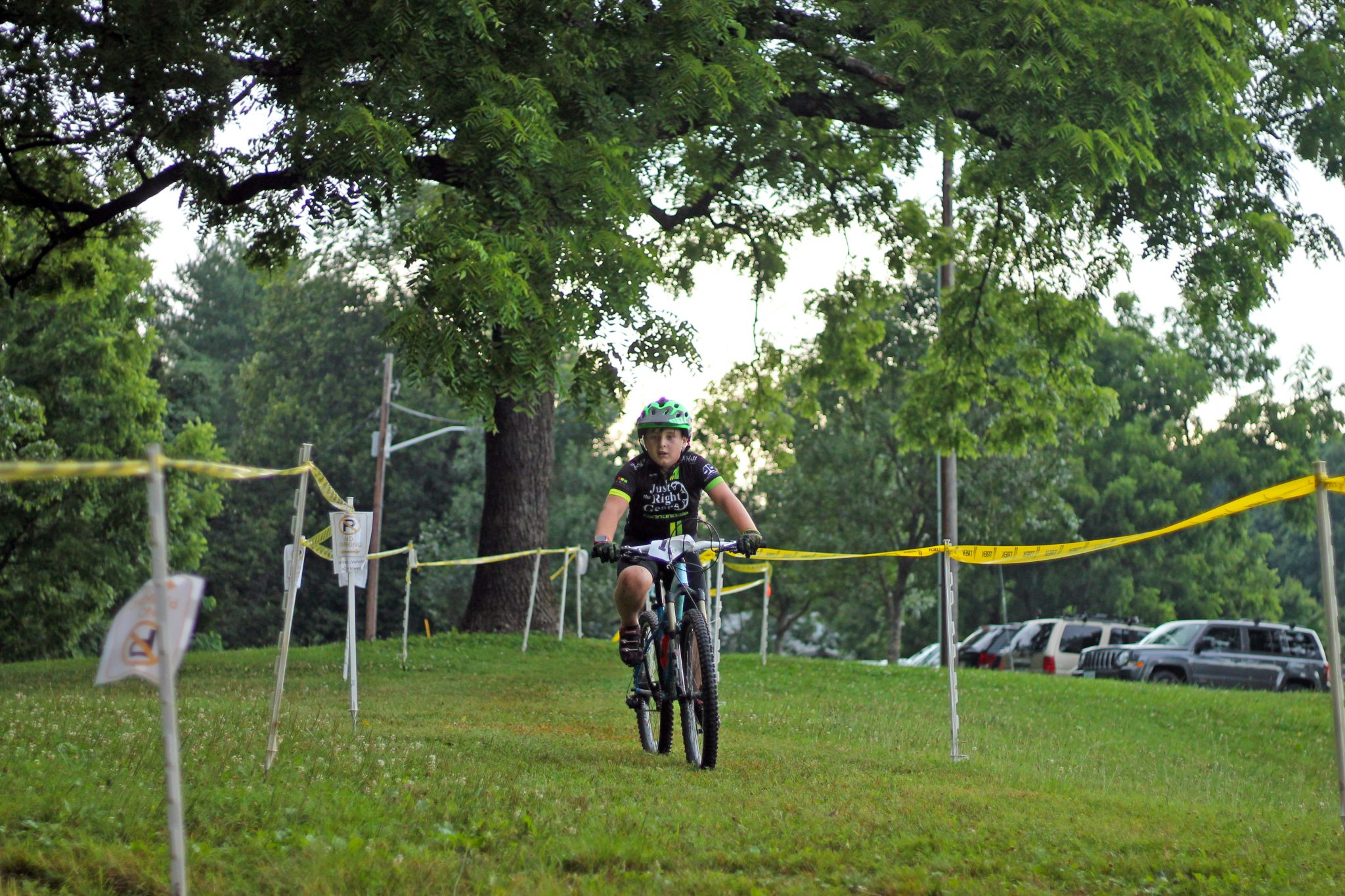 Fishburn youth mountain biker rides down straightaway at the Roanoke Parks and Recreation event