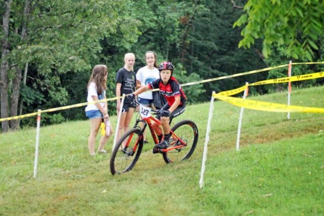 Fishburn youth mountain biker rides out of a turn at the Roanoke Parks and Recreation event