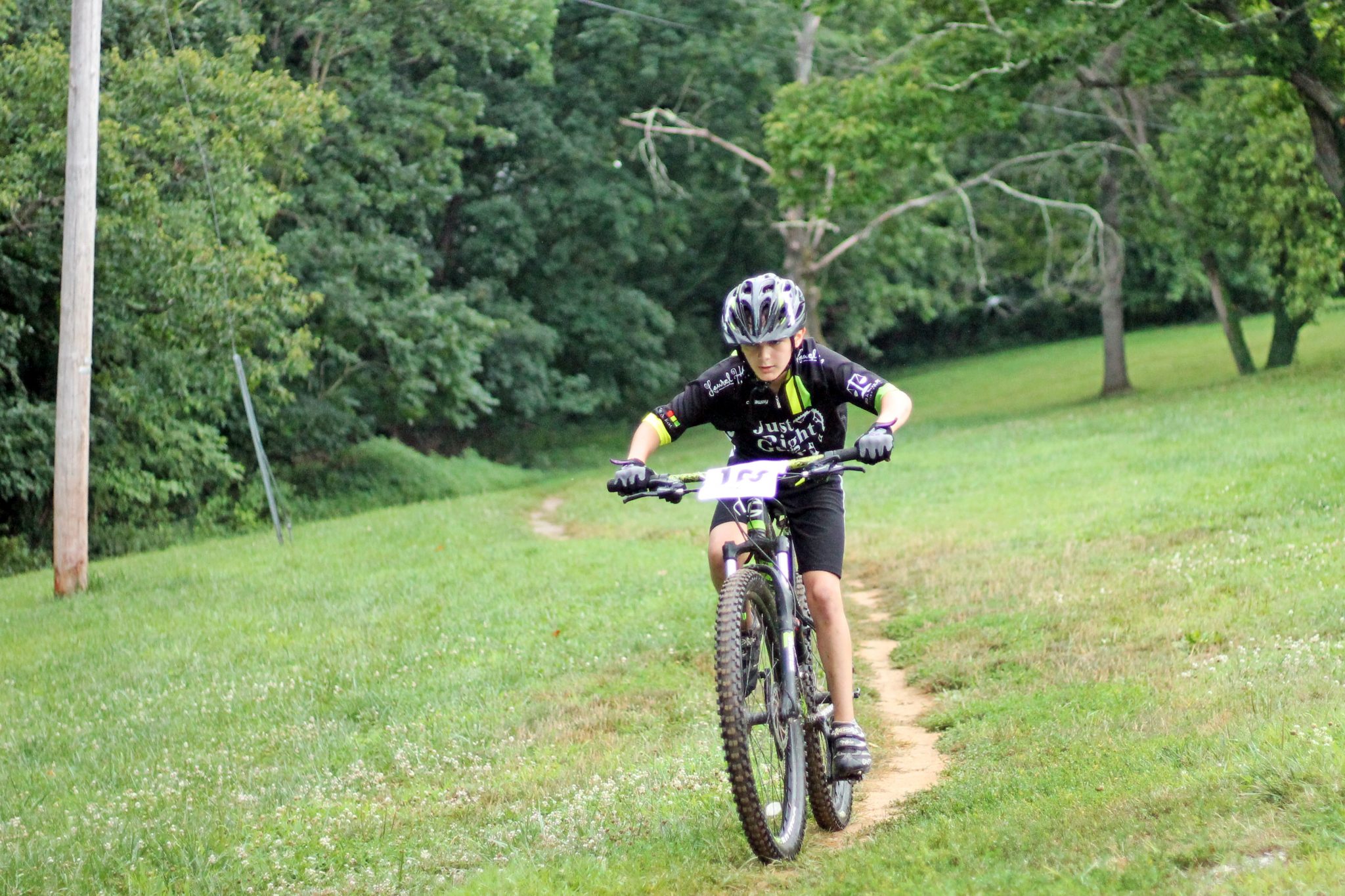 Fishburn youth mountain biker rides out of the woods