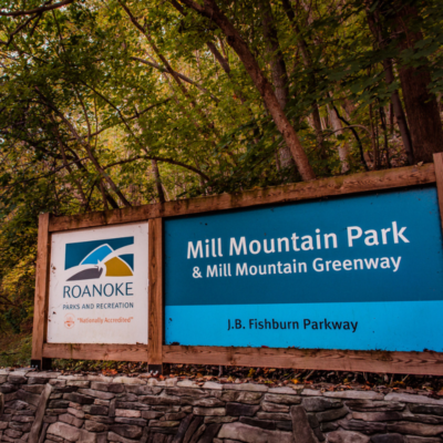 Sign reading "Mill Mountain Park & Mill Mountain Greenway"