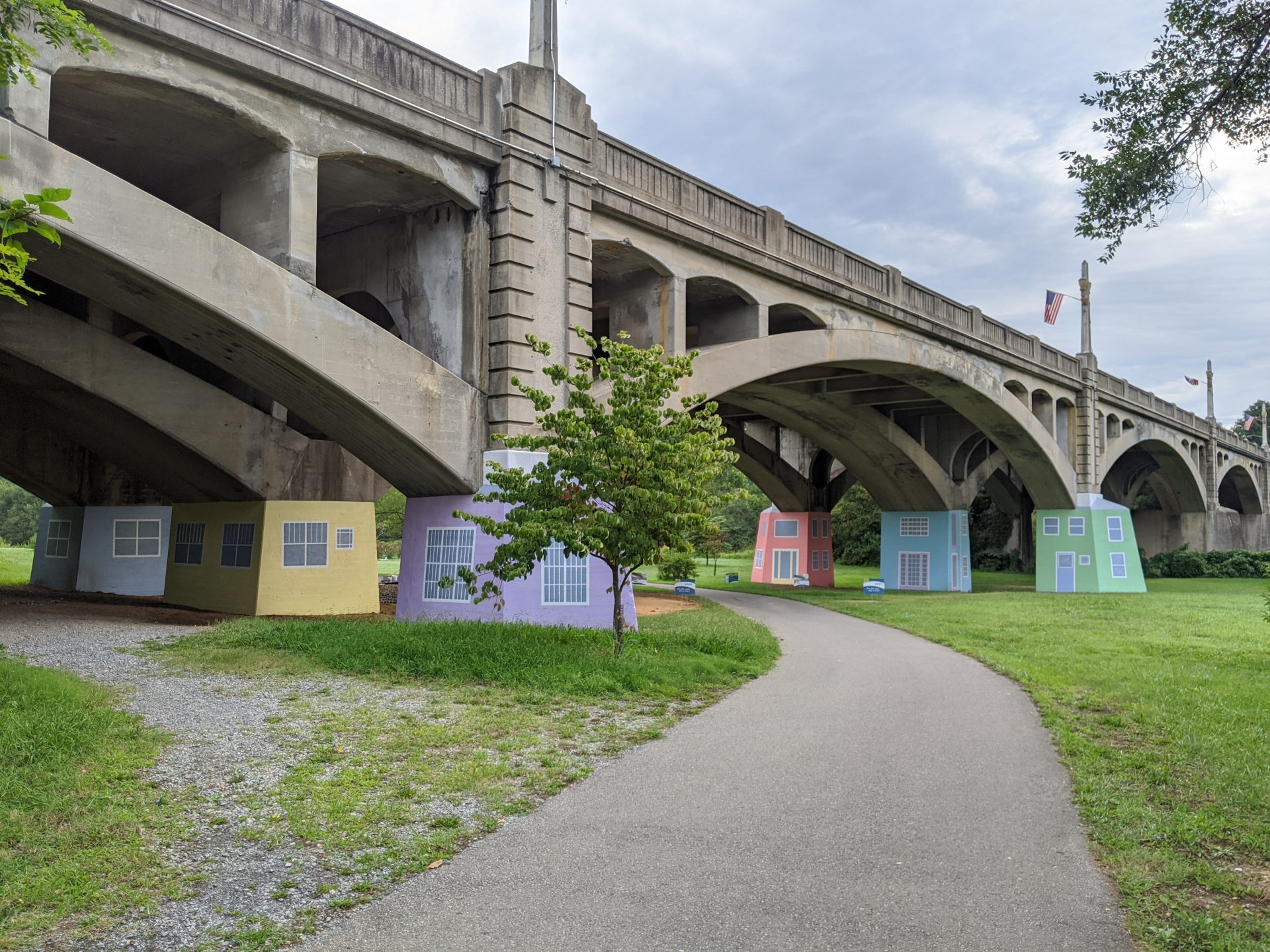 Memorial Bridge Park with public art murals on footers of bridge.