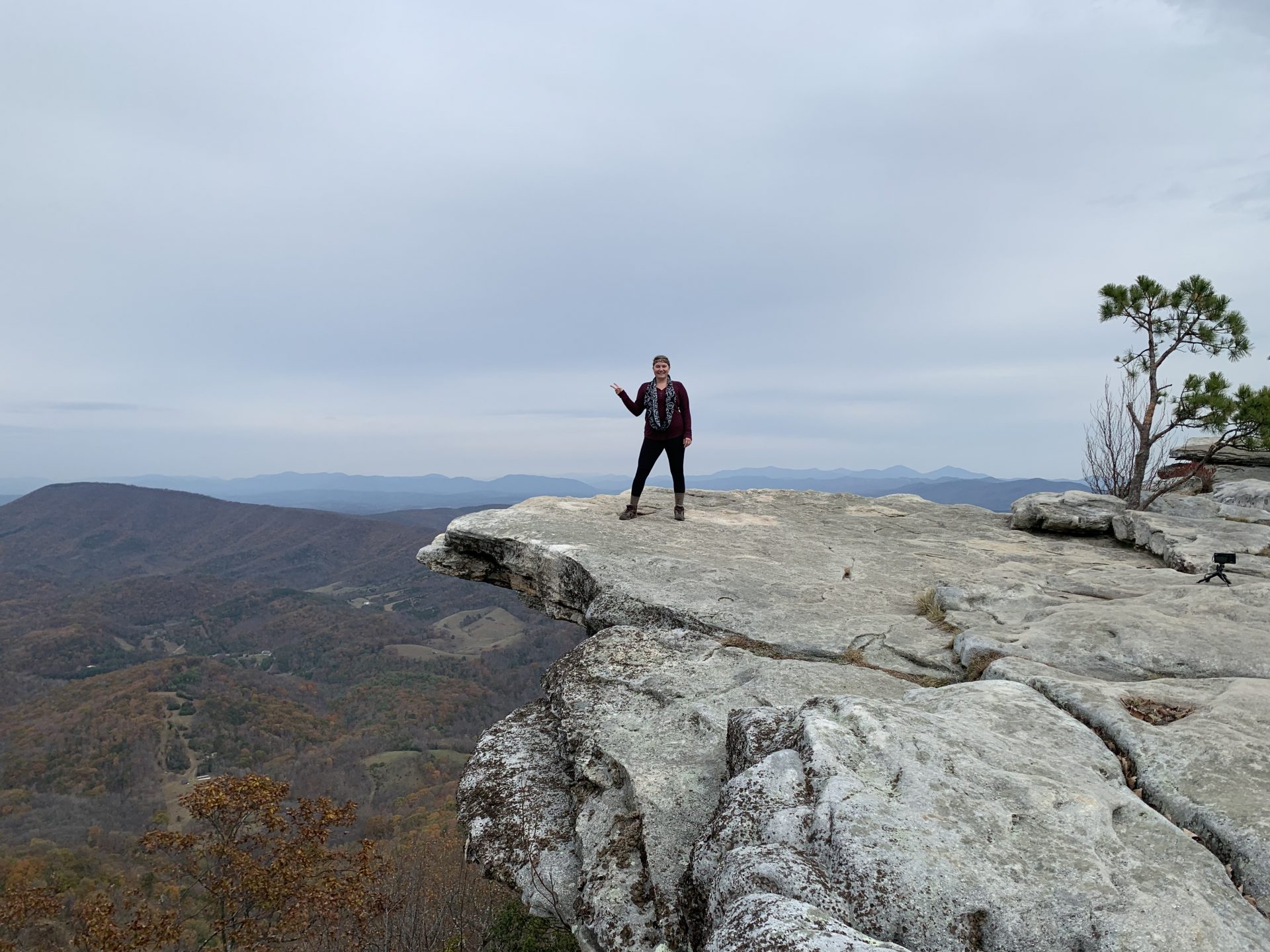 Young Woman Poses on rock overlook