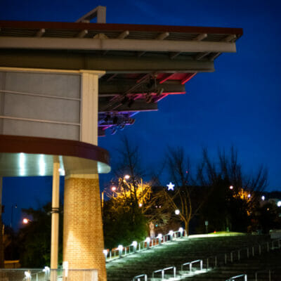 Elmwood Park Amphitheater at night with Mill Mountain Star visible in distance