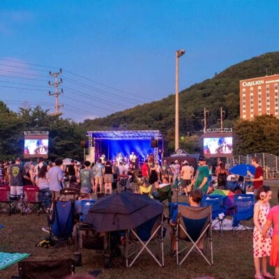 Freedom Festival and Fireworks Roanoke A crowd watching live music at River's Edge Park before Fireworks Show