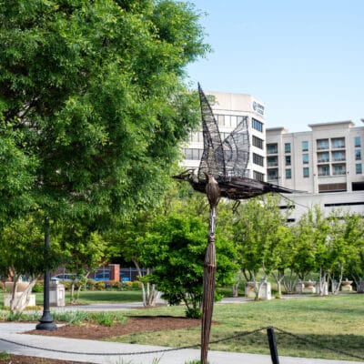 Larger than Life Sculpture resembling a paintbrush and pileated woodpecker