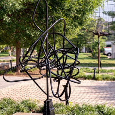 Larger than Life Sculpture resembling a tangled cord and outlet