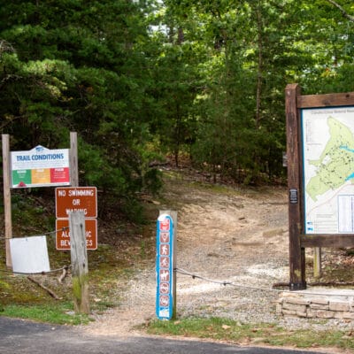 Trailhead at the Boat Dock Signs with maps, trail conditions, and other info at a trailhead in Carvins Cove