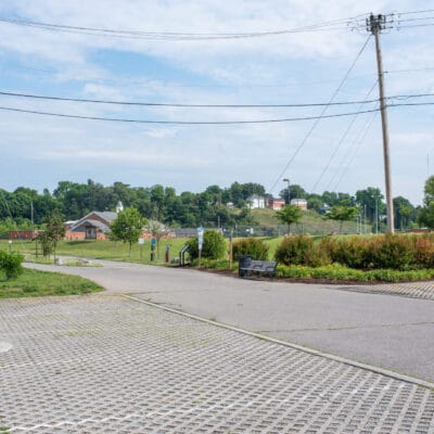 Parking lot with permeable pavers at a greenway.